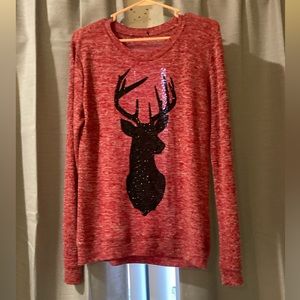 Such a beautiful reindeer sweater.